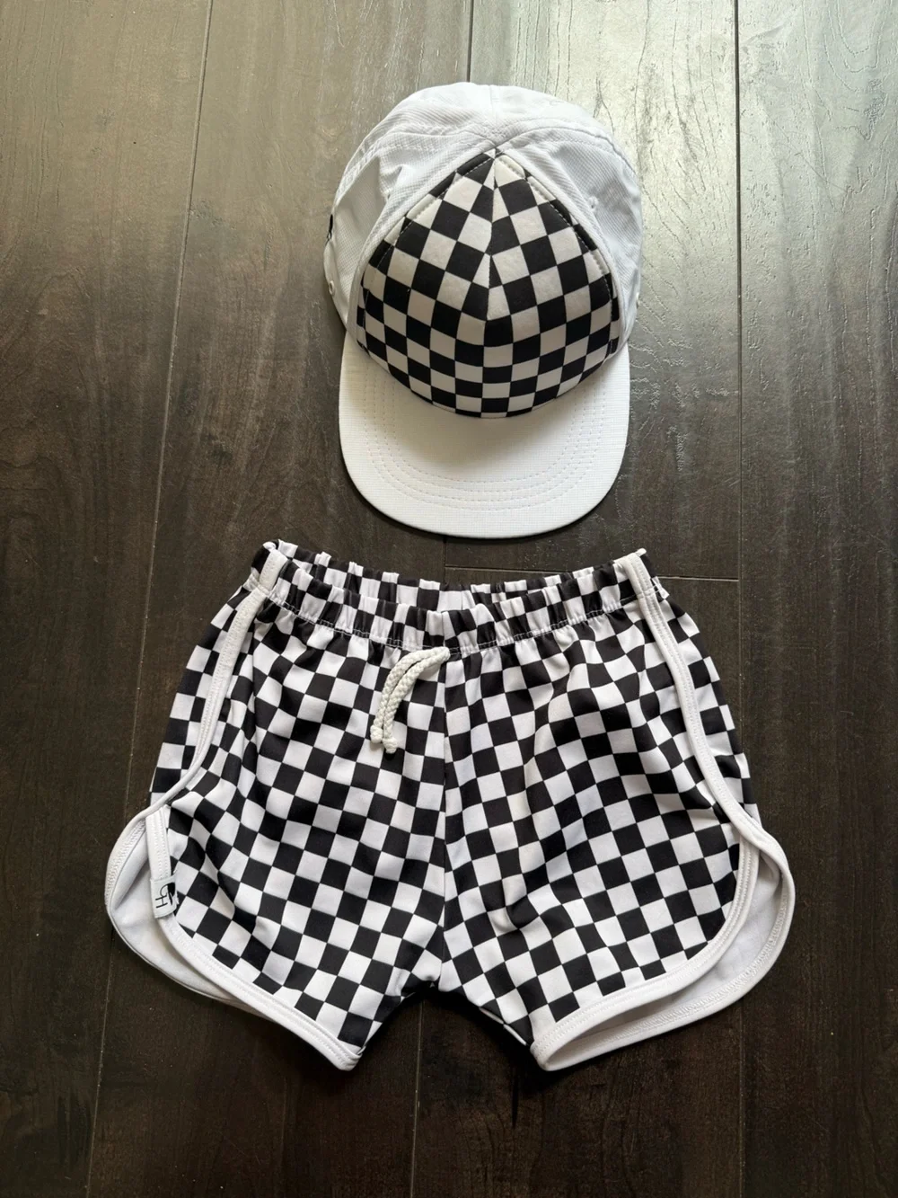 George Hats Kids black and white checkered Swim Shorts and trucker hat